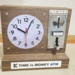 アート作品「時間を買える貯金箱」
